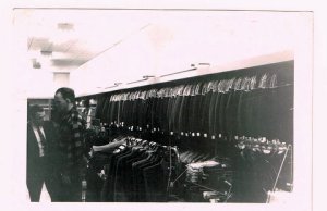 My father serving a customer in his store on James St., Hamilton